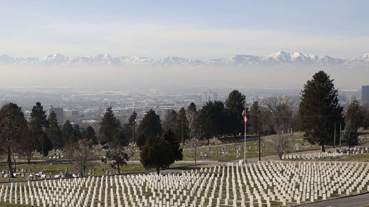 Smog settles over the Salt Lake Valley during an inversion as seen from the Salt Lake City Cemetery in Salt Lake
City on Wednesday. HB109, sponsored by Rep. Steve Handy, R-Layton, would allow physicians to indicate that poor air
quality contributed to an individual’s death on the death certificate.