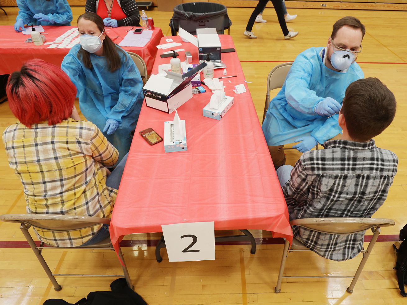 Viewmont High School students are tested for COVID-19 at the school in Bountiful on Wednesday. A pediatric infectious diseases doctor on Friday urged Utahns not to underestimate the effects of the omicron variant — including for children.