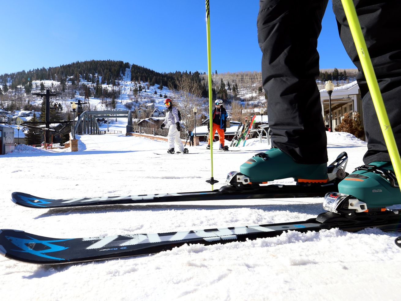 Skiers and snowboarders move to get on a lift in Park City on Tuesday. Contract negotiations continue between the ski patrol union and Vail-owned Park City Mountain Resort.