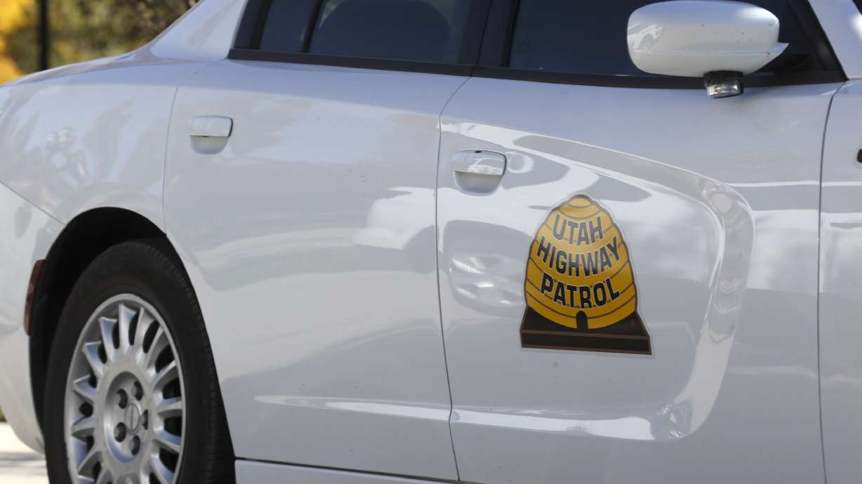 A fugitive was arrested Wednesday after police say he rammed the vehicle of an agent trying to arrest him, then led Utah Highway Patrol troopers on chases in central Utah.