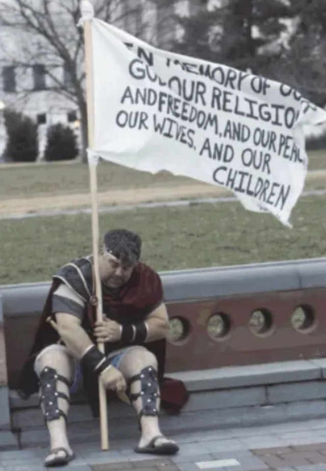 Nathan Wayne Entrekin sits on a bench near the U.S. Capitol on Jan. 6, 2021. The FBI says the photo was posted publicly
on Twitter. Entrekin pleaded guilty Friday to breaching the
Capitol.