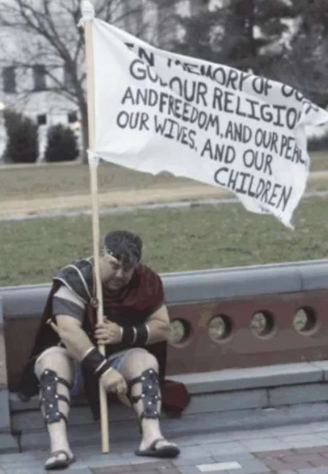 Nathan Wayne Entrekin sits on a bench near the U.S. Capitol on Jan. 6, 2021. The FBI says the photo was posted publicly
on Twitter. Entrekin pleaded guilty Friday to breaching the
Capitol.