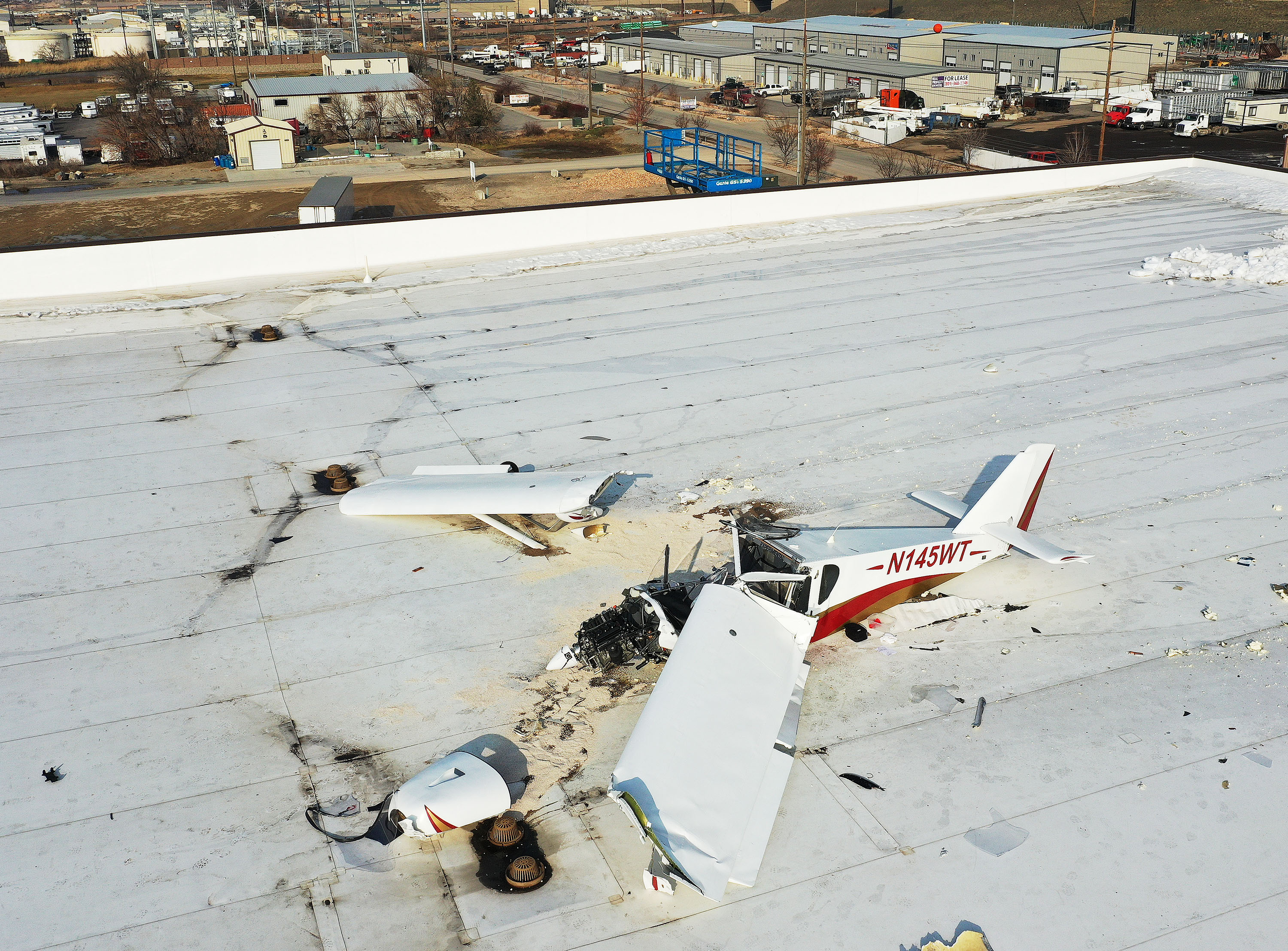 An airplane crashed near the Spanish Fork Airport on the roof of Mountain Country Foods in Spanish Fork on Friday.