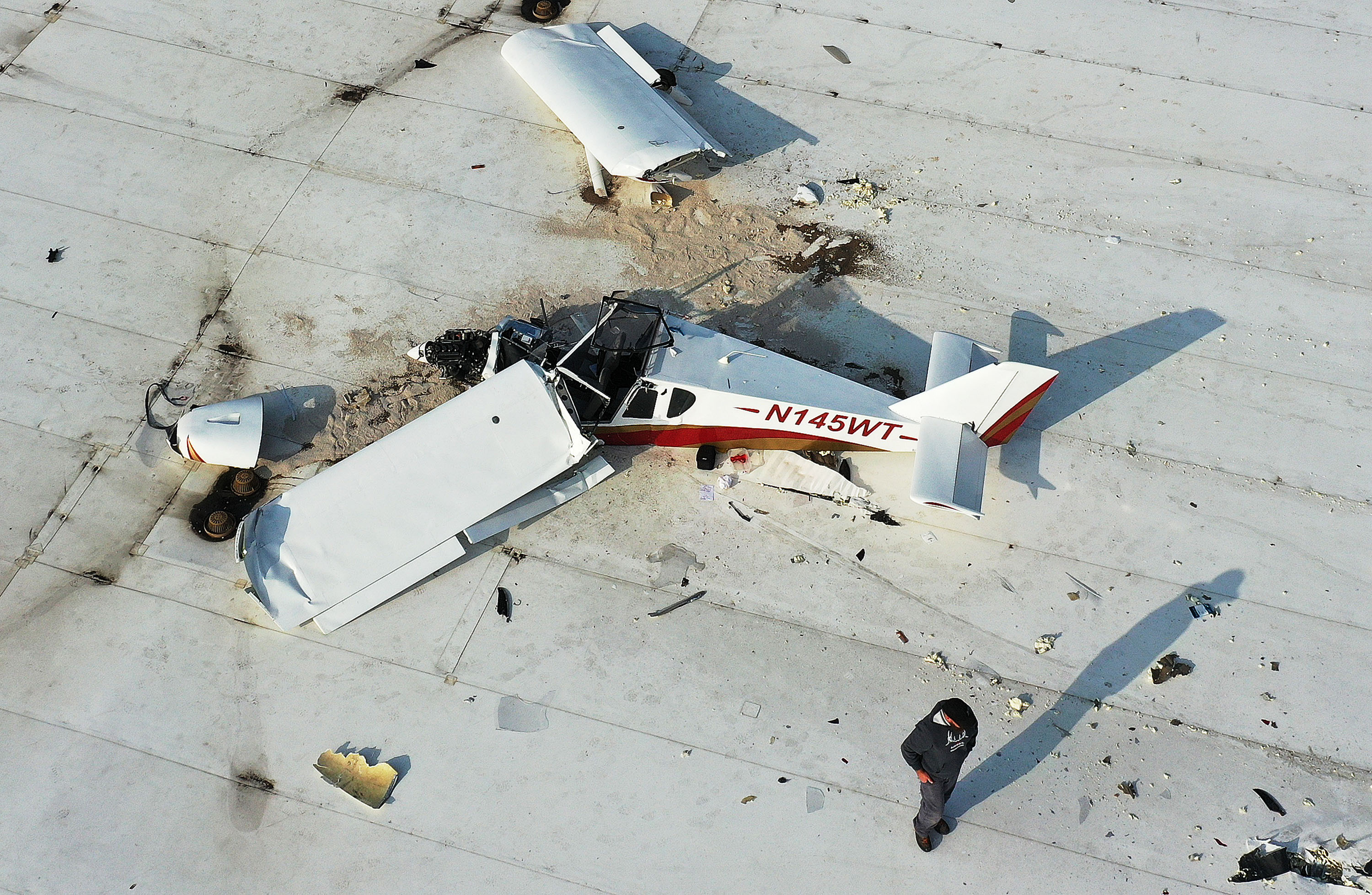 An airplane crashed near the Spanish Fork Airport on the roof of Mountain Country Foods in Spanish Fork on Friday.