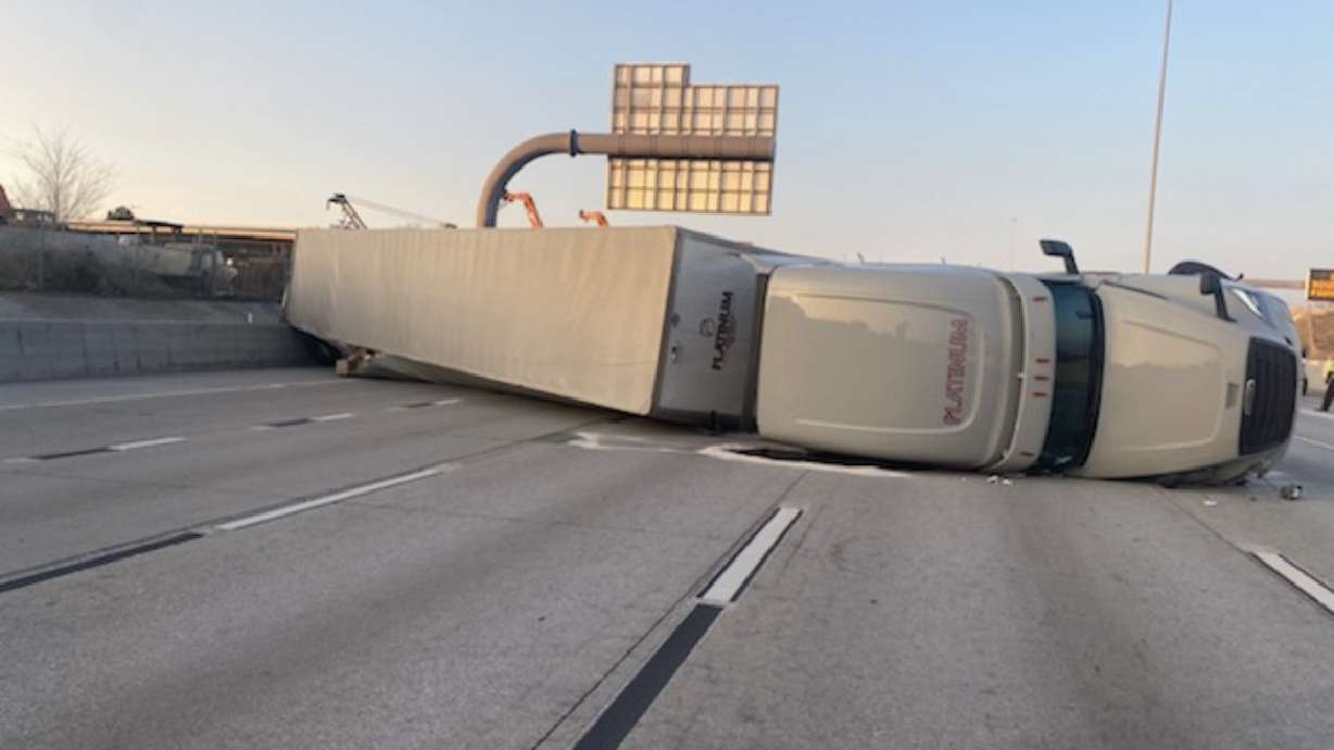 An overturned semitruck blocked multiple southbound lanes of I-15 on Friday afternoon near 4000 South in Murray, with the accident causing minor injuries and major delays.
