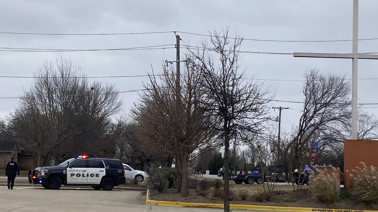 Colleyville police secure the area around Congregation Beth Israel synagogue on Saturday, in Colleyville, Texas.