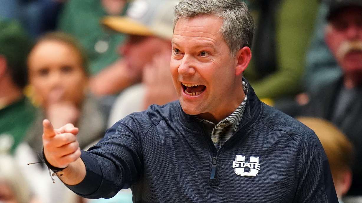Utah State Aggies head coach Ryan Odom reacts to a call during the second half of an NCAA college basketball game against Colorado State Wednesday, Jan. 12, 2022, in Fort Collins, Colo. Colorado State beat Utah State 77-72.