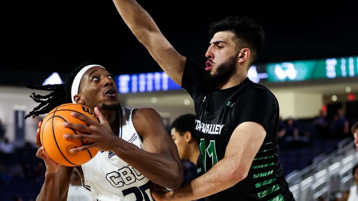 Fardaws Aimaq defends against Cal Baptist, Saturday, Jan. 15, 2022 during an NCAA college basketball game in Riverside, Calif.