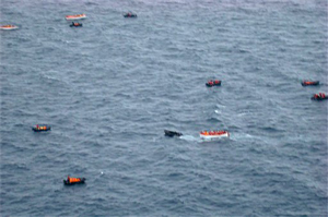 Passengers from the Liberian-flagged Explorer cruise ship are transported on lifeboats after their ship, unseen, hit an object and began to sink in Antarctic waters, Friday, Nov. 23, 2007.(AP Photo/Chile Air Force)