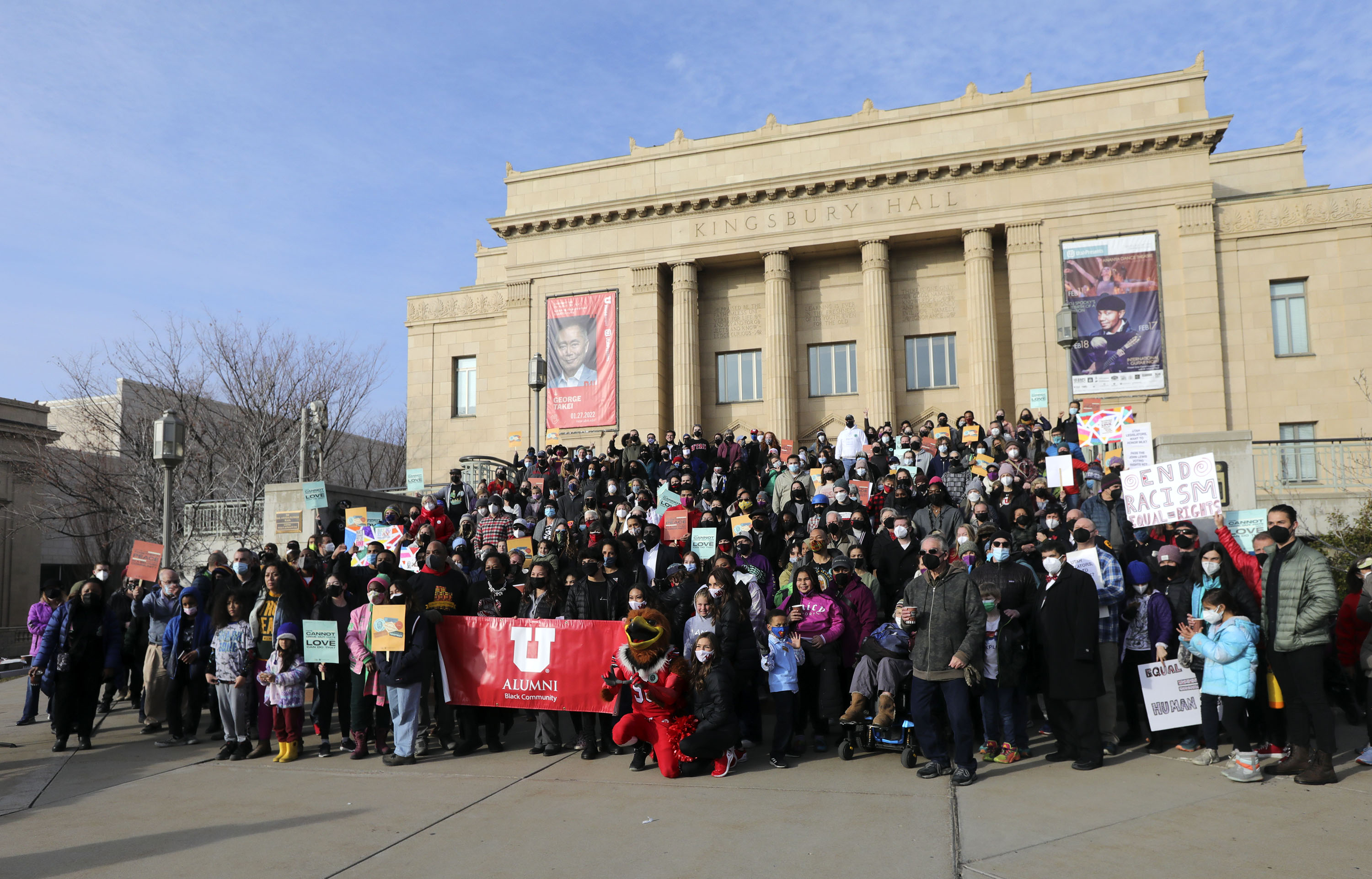 Participants pose for a photo after marching from East High School to Kingsbury Hall for the MLK Day Rally and March, as part of the University of Utah’s Dr. Martin Luther King Jr. Week, in Salt Lake City on Monday.