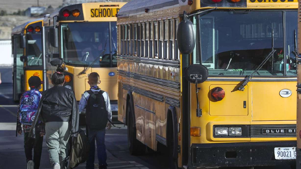 Students walk to their buses following school at Rose Springs Elementary in Erda, Tooele County, on Nov. 5, 2020.