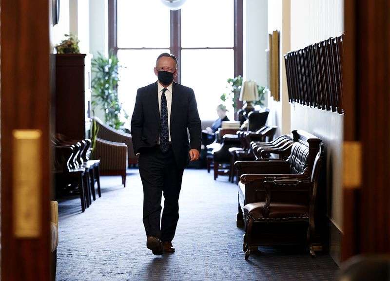Utah Senate President Stuart Adams walks through the
Senate offices at the Capitol in Salt Lake City on Wednesday.