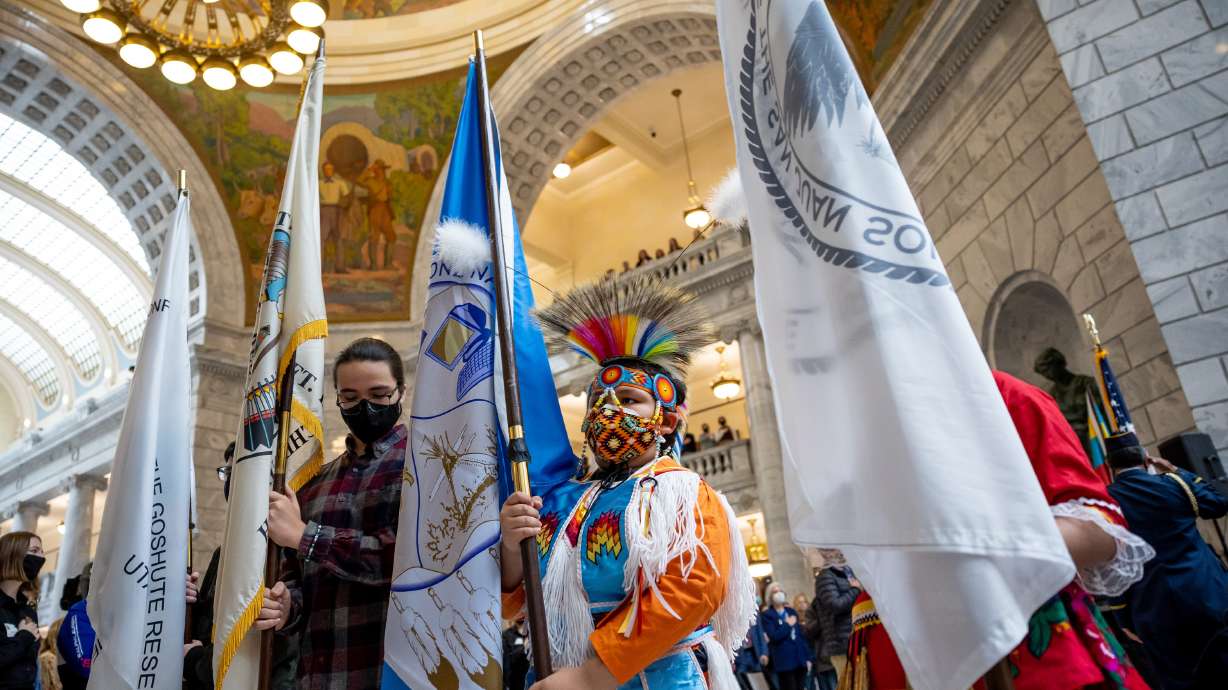 Sebastian Renteria, 9, a member of the Navajo Nation, presents one of Utah’s 10 flags during a color guard at the start of an event proclaiming Jan. 19 as More Than a Flag Day at the Capitol building in Salt Lake City on Wednesday.