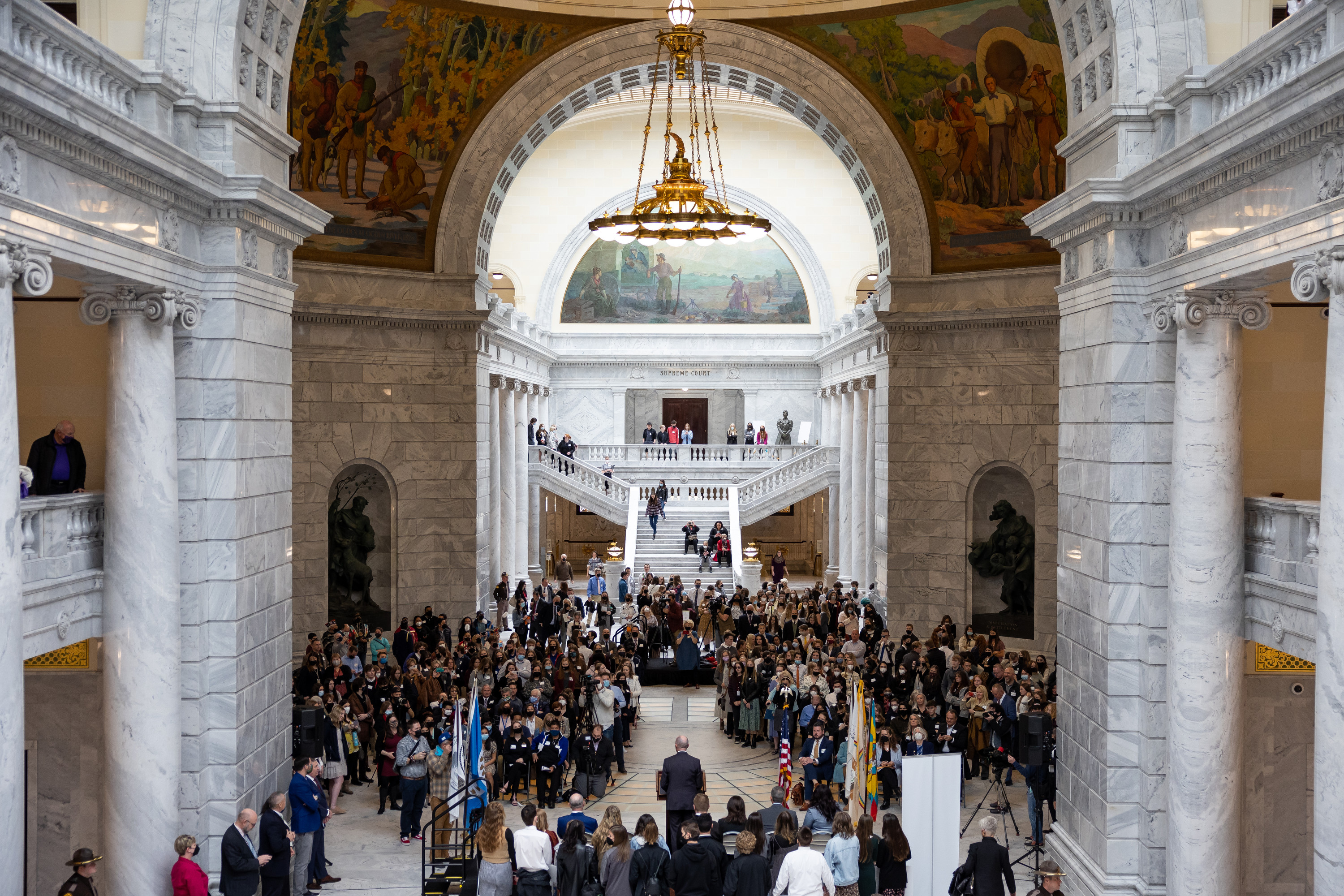 Gov. Spencer Cox, bottom center, leads an event proclaiming Jan. 19 as More Than a Flag Day at the Capitol in Salt Lake City on Wednesday.