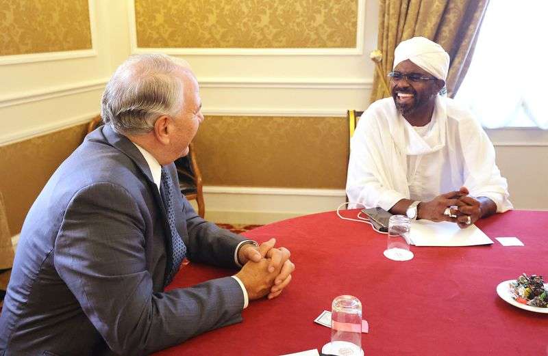 Elder Ronald A. Rasband, a member of the of Quorum of
the Twelve Apostles of The Church of Jesus Christ of Latter-day
Saints, laughs while talking to Nasar-Eddin Mofarih, Sudan’s
minister of religious affairs, during the G20 Interfaith Forum in
Bologna, Italy, on Sunday, Sept. 12, 2021.