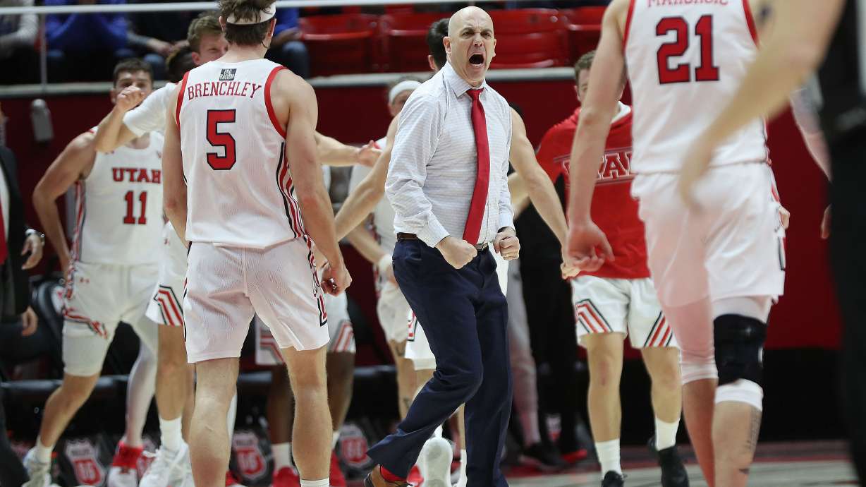 Utah Utes head coach Craig Smith celebrates after a Ute defensive stand against UCLA in Salt Lake City on Thursday, Jan. 20, 2022.