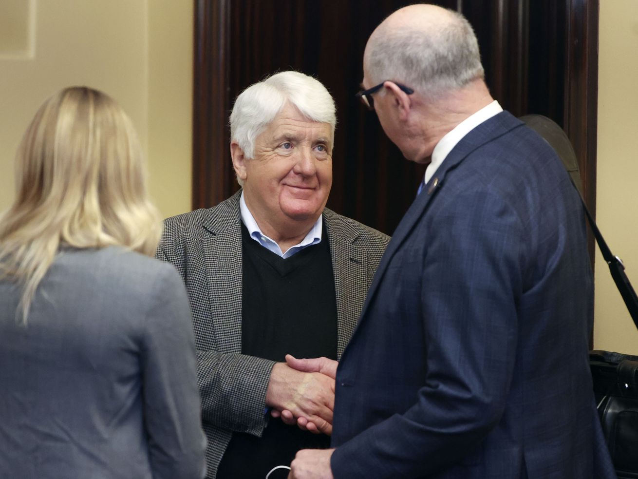 Former Republican Congressman Rob Bishop shakes hands
with Rep. Steve Handy, R-Layton, before Bishop’s presentation on
federalism at the Capitol in Salt Lake City on Friday.