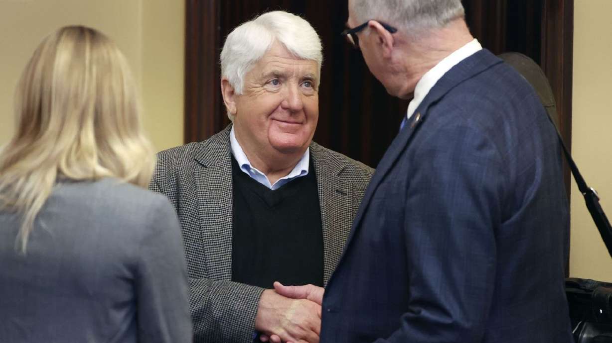 Former Republican Congressman Rob Bishop shakes hands
with Rep. Steve Handy, R-Layton, before Bishop’s presentation on
federalism at the Capitol in Salt Lake City on Friday.