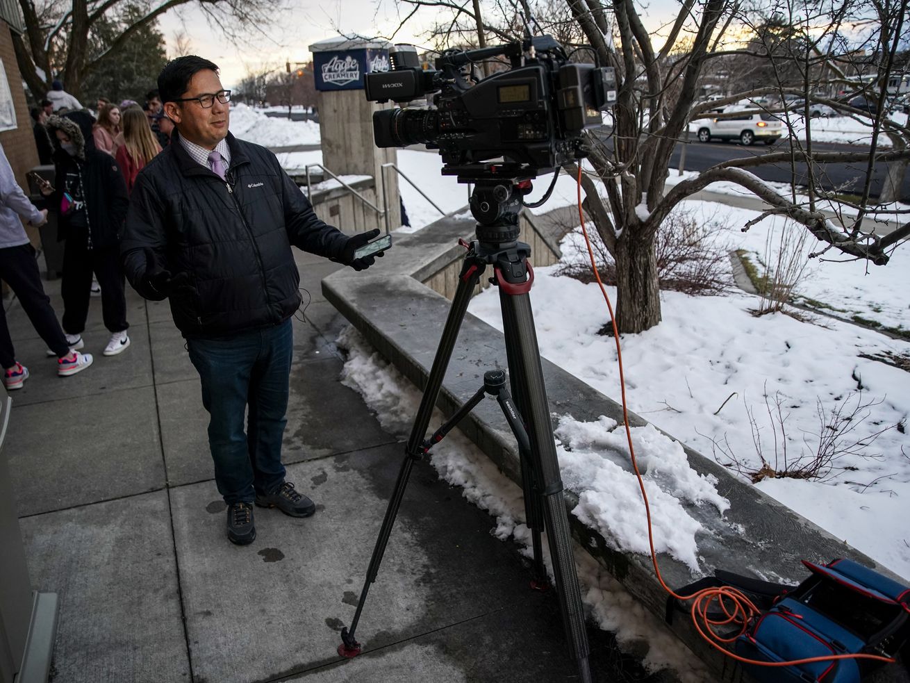 Mike Anderson, a reporter for KSL-TV, multitasks on
reporting, shooting and editing on his own video in Logan on
Friday.