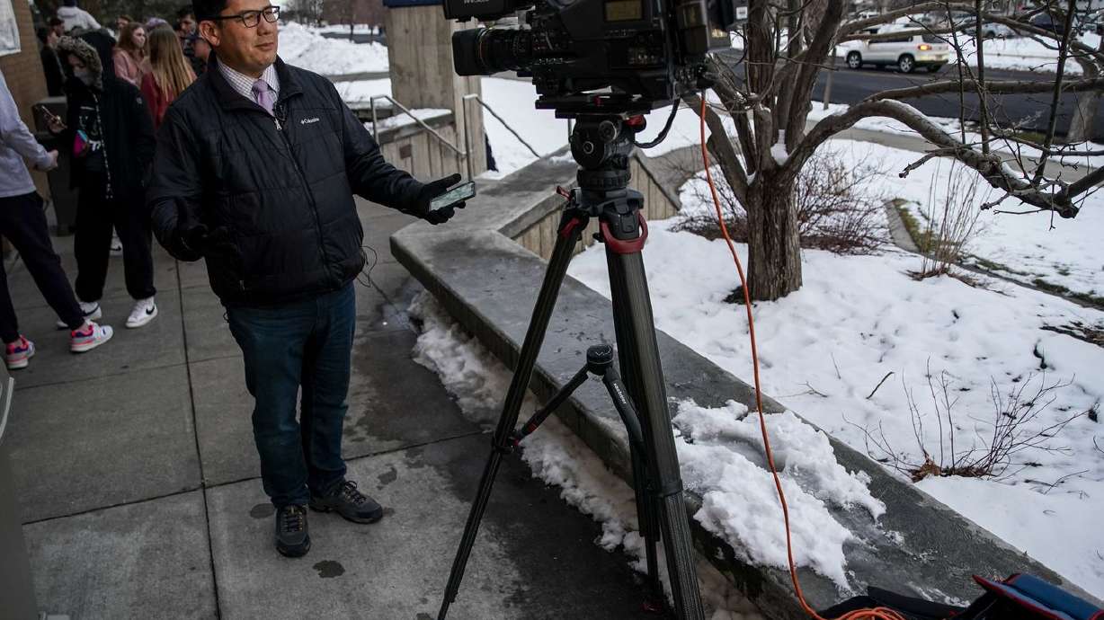 Mike Anderson, a reporter for KSL-TV, multitasks on
reporting, shooting and editing on his own video in Logan on
Friday.