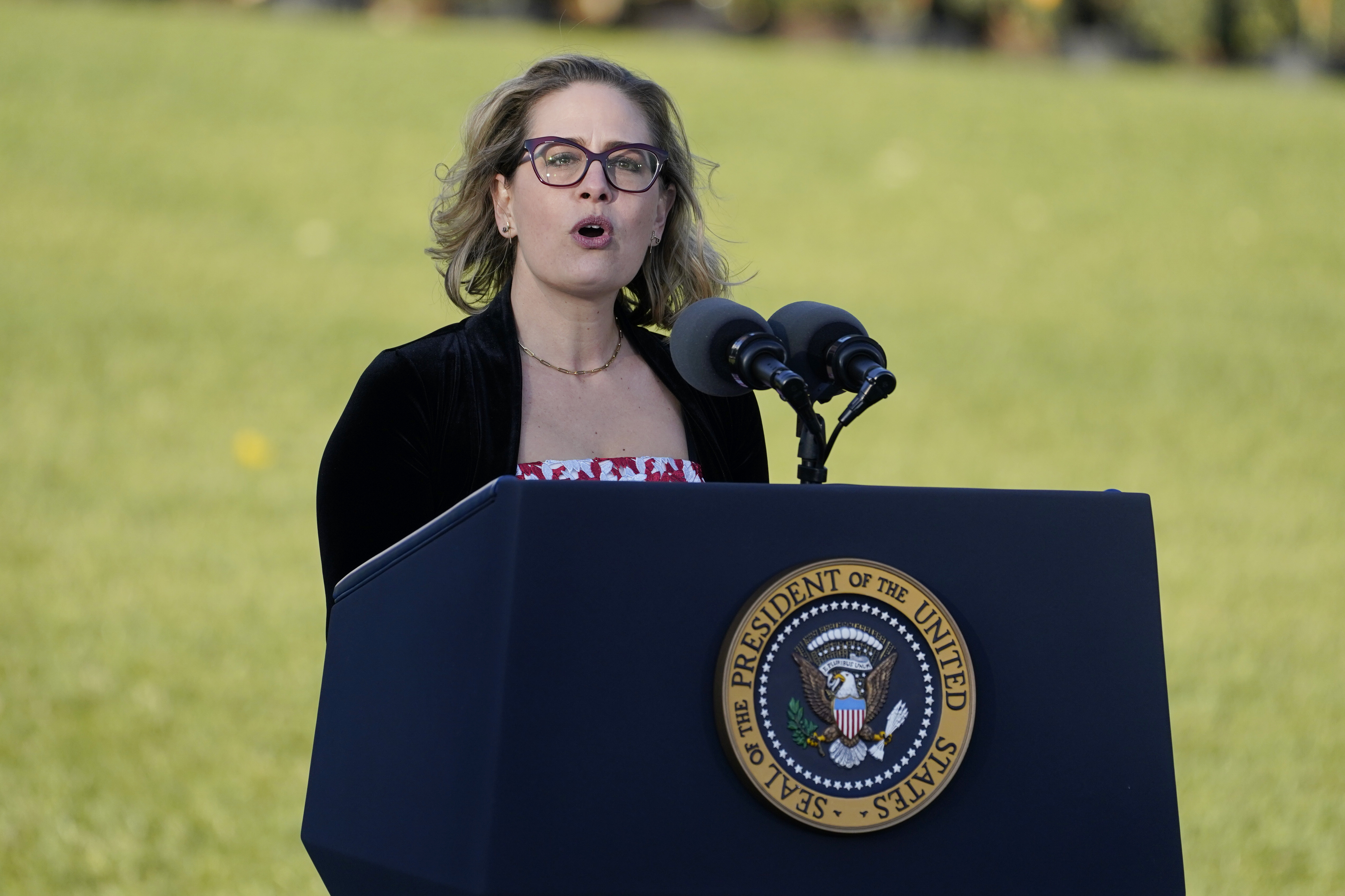 Sen. Kyrsten Sinema, D-Ariz., speaks before President Joe Biden signs the $1.2 trillion bipartisan infrastructure bill into law during a ceremony on the South Lawn of the White House in Washington, on Nov. 15, 2021.