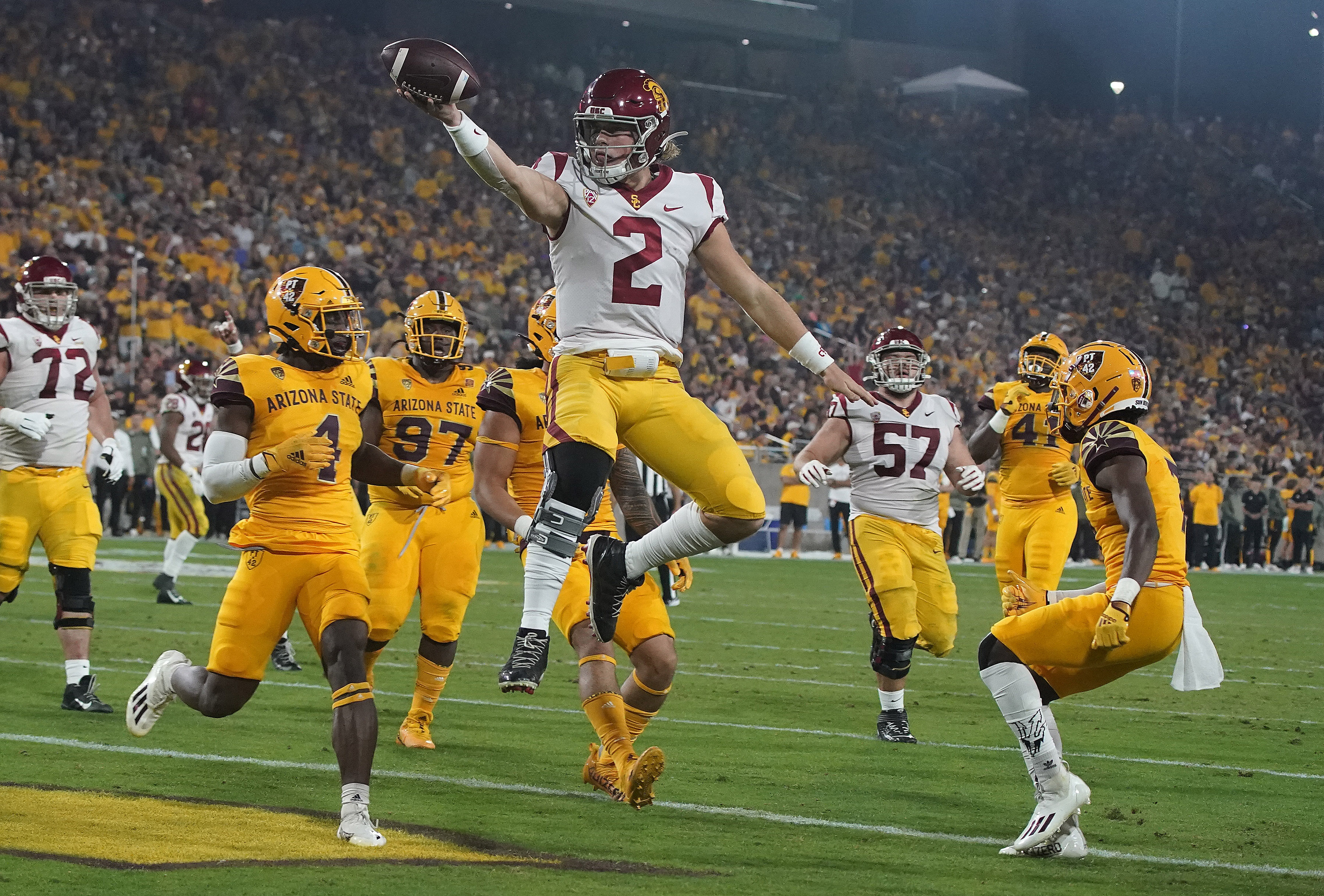 Southern California quarterback Jaxson Dart (2) celebrates a touchdown against Arizona State during the first half Saturday, Nov. 6, 2021, in Tempe, Ariz.