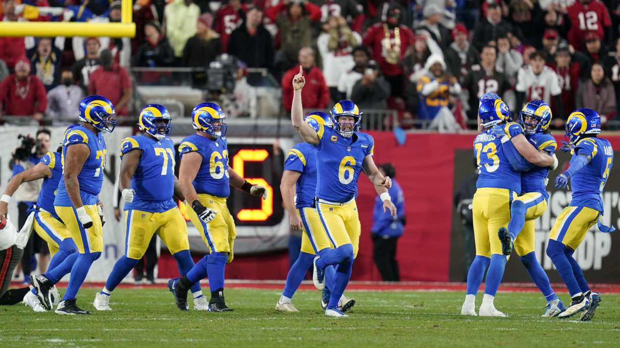 Los Angeles Rams holder Johnny Hekker (6) celebrates with teammates after kicker Matt Gay kicked the game-winning field goal against the Tampa Bay Buccaneers during the final seconds of an NFL divisional round playoff football game, Sunday, Jan. 23, 2022, in Tampa, Fla.