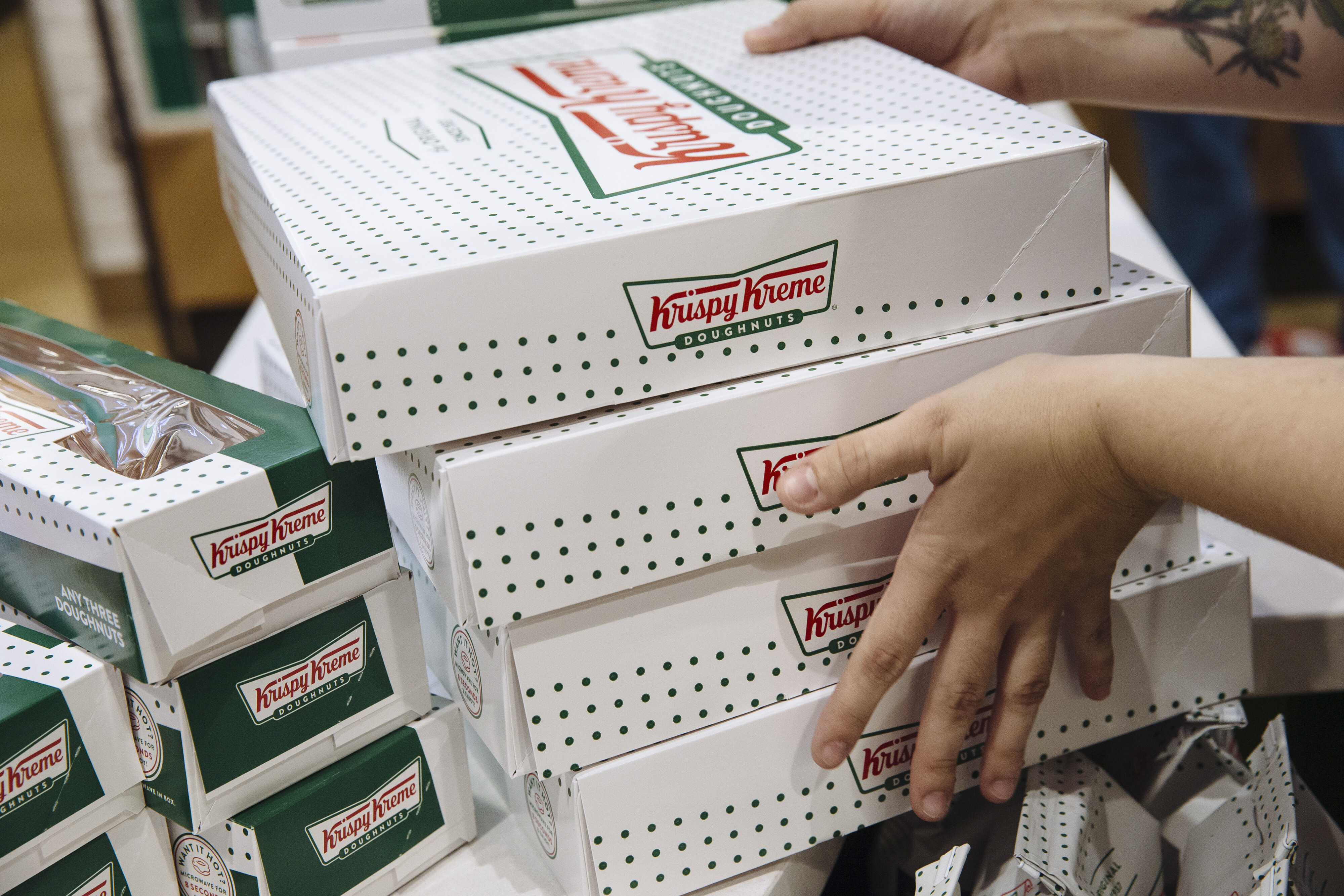 Krispy Kreme, pictured in Times Square will give away a dozen original glazed doughnuts to people that donated blood to the American Red Cross.