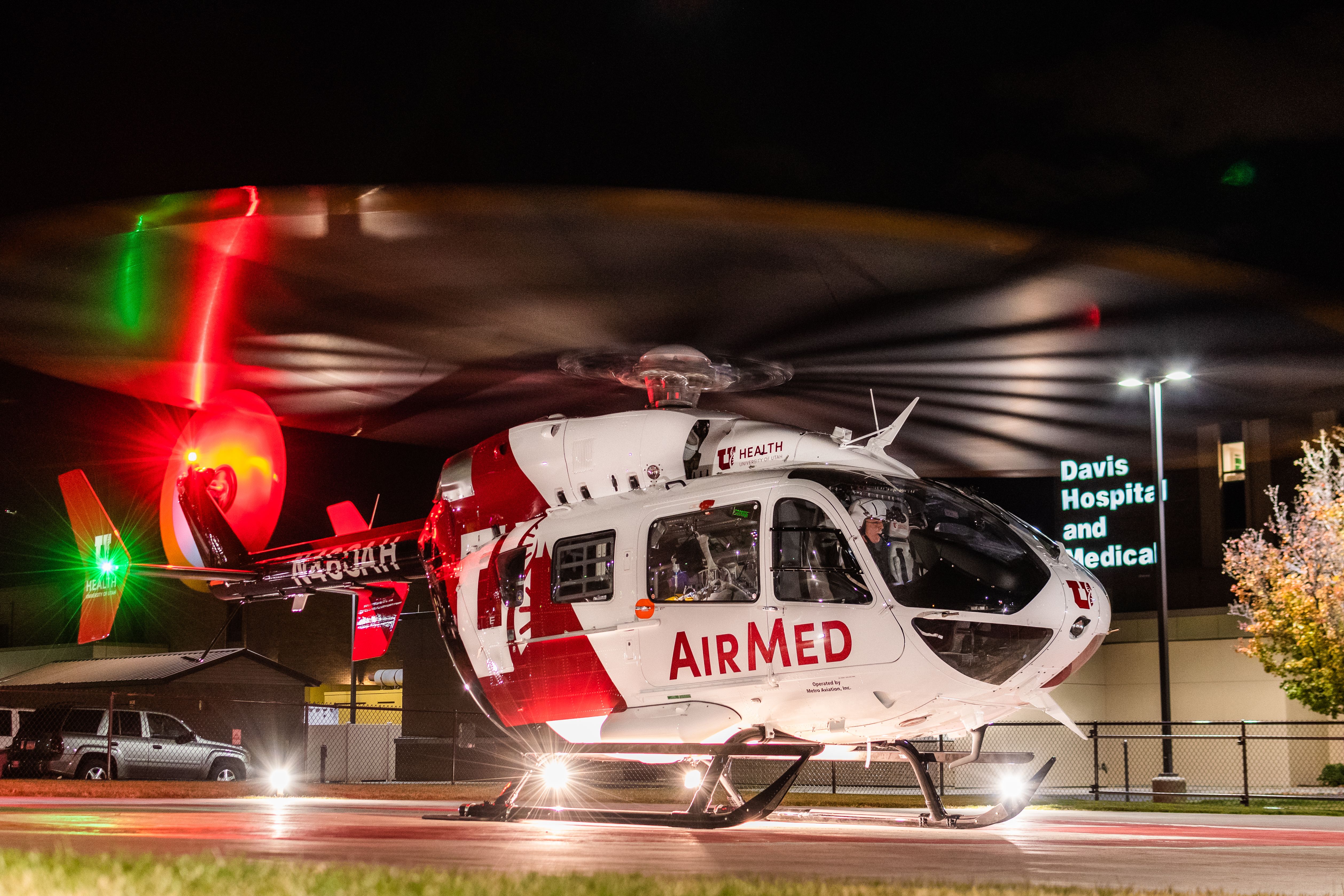 An AirMed helicopter lands at night. University of Utah AirMed Program Manager Frankie Toon said on Tuesday that in the last few weeks a helicopter was hit twice with lasers from the ground.