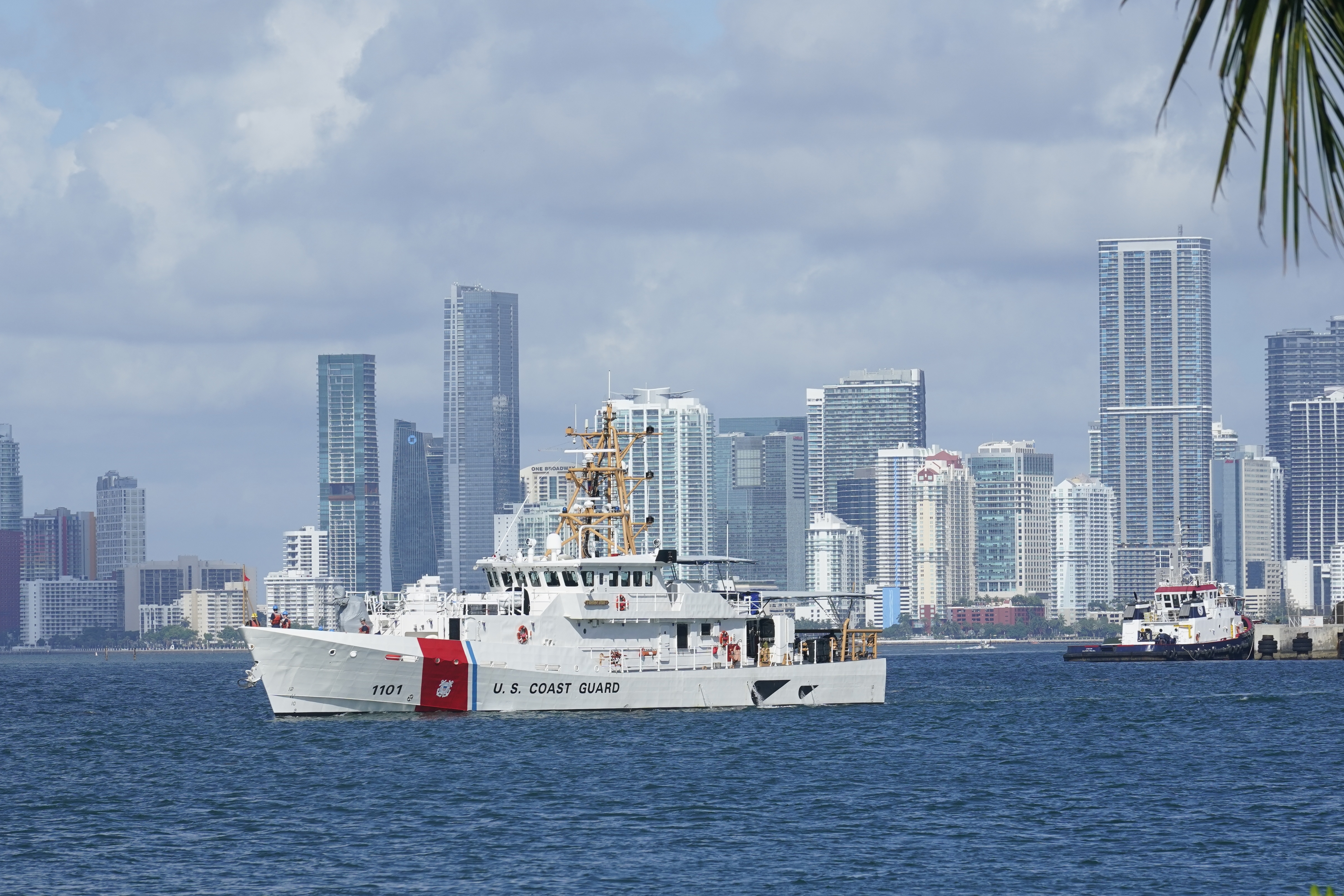 The U.S. Coast Guard ship Bernard C. Webber, leaves the Coast Guard base, July 19, 2021, in Miami Beach, Fla. The U.S. Coast Guard is searching for 39 people after a good Samaritan rescued a man clinging to a boat off the coast of Florida.