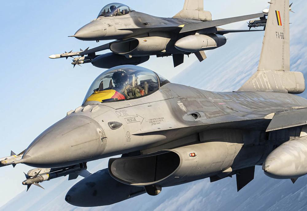 Belgium Air Force F-16 fighter jet participating in NATO's Baltic Air Policing Mission operate in Lithuanian airspace, Tuesday.