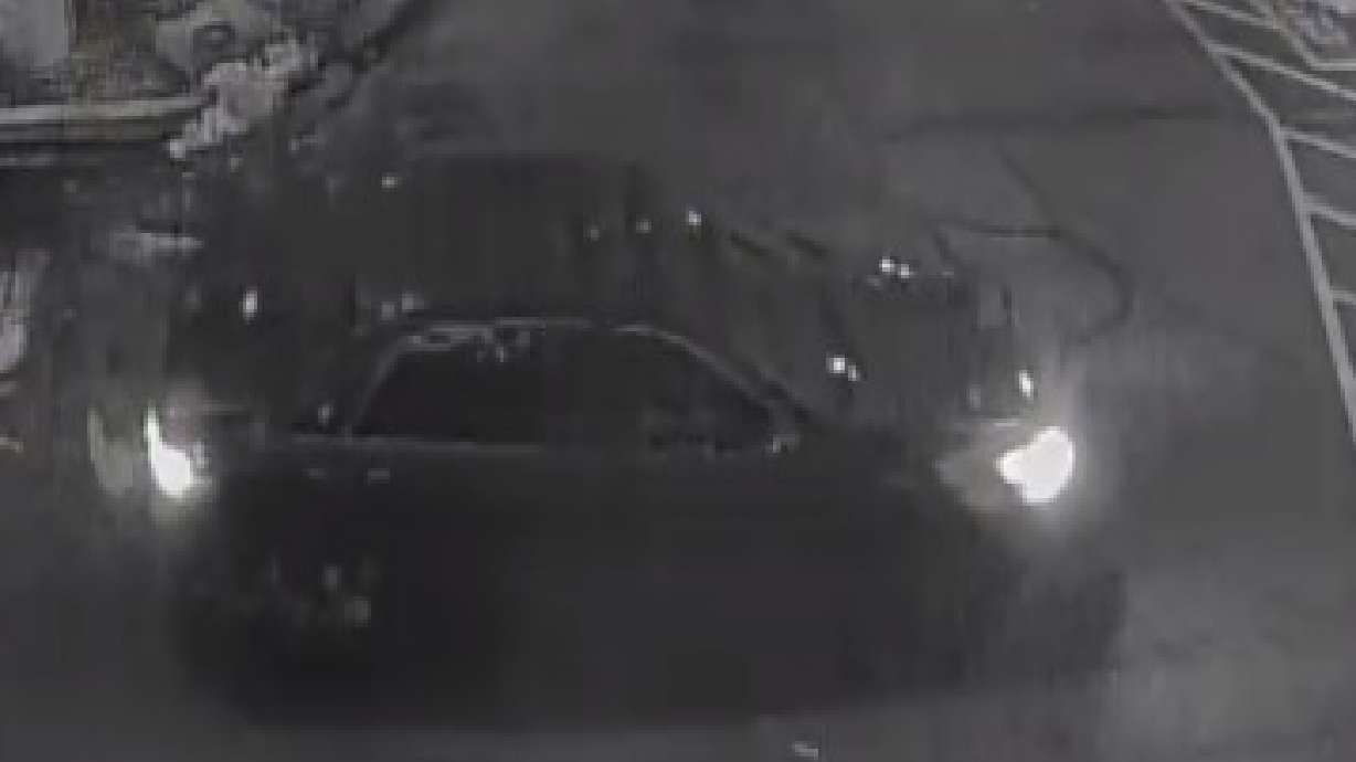 Police are looking for two people who shot a teen who has autism in the back with a pellet or BB gun. The duo drove away in a blue sedan, captured here by a surveillance camera.