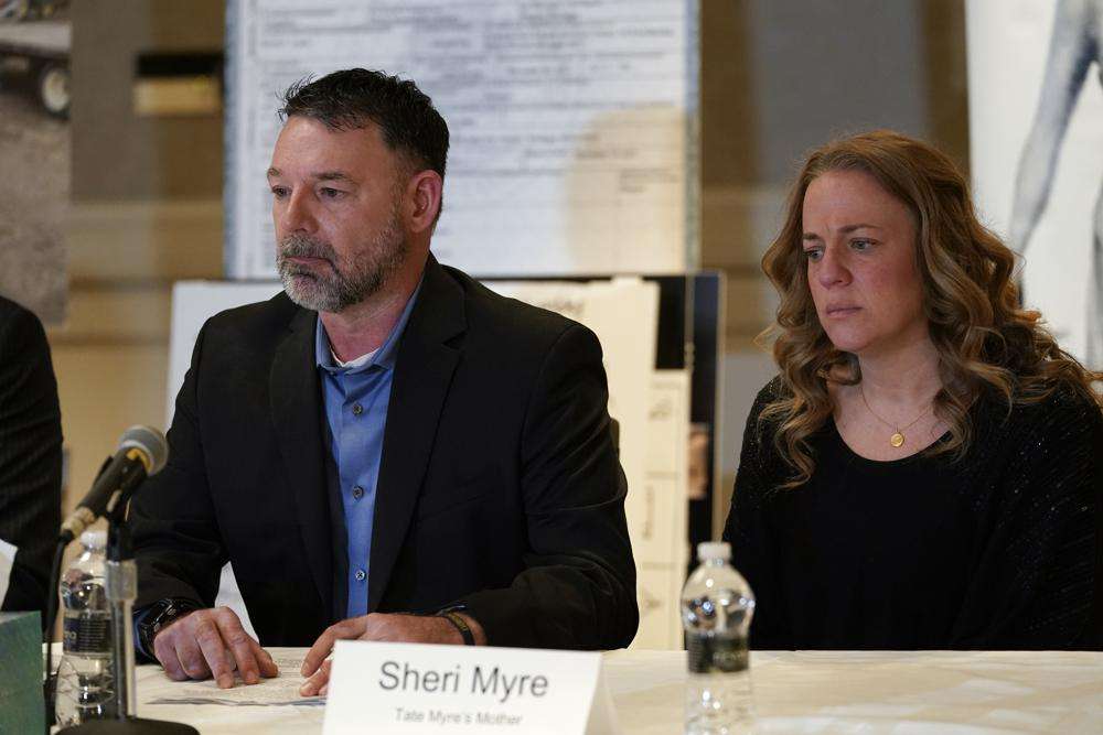 William Myre, and his wife Sheri, parents of Tate More, appear during a news conference in Southfield, Mich., Thursday.