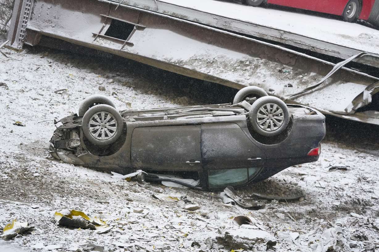A car that was on a bridge when it collapsed is seen Friday in Pittsburgh's East End.