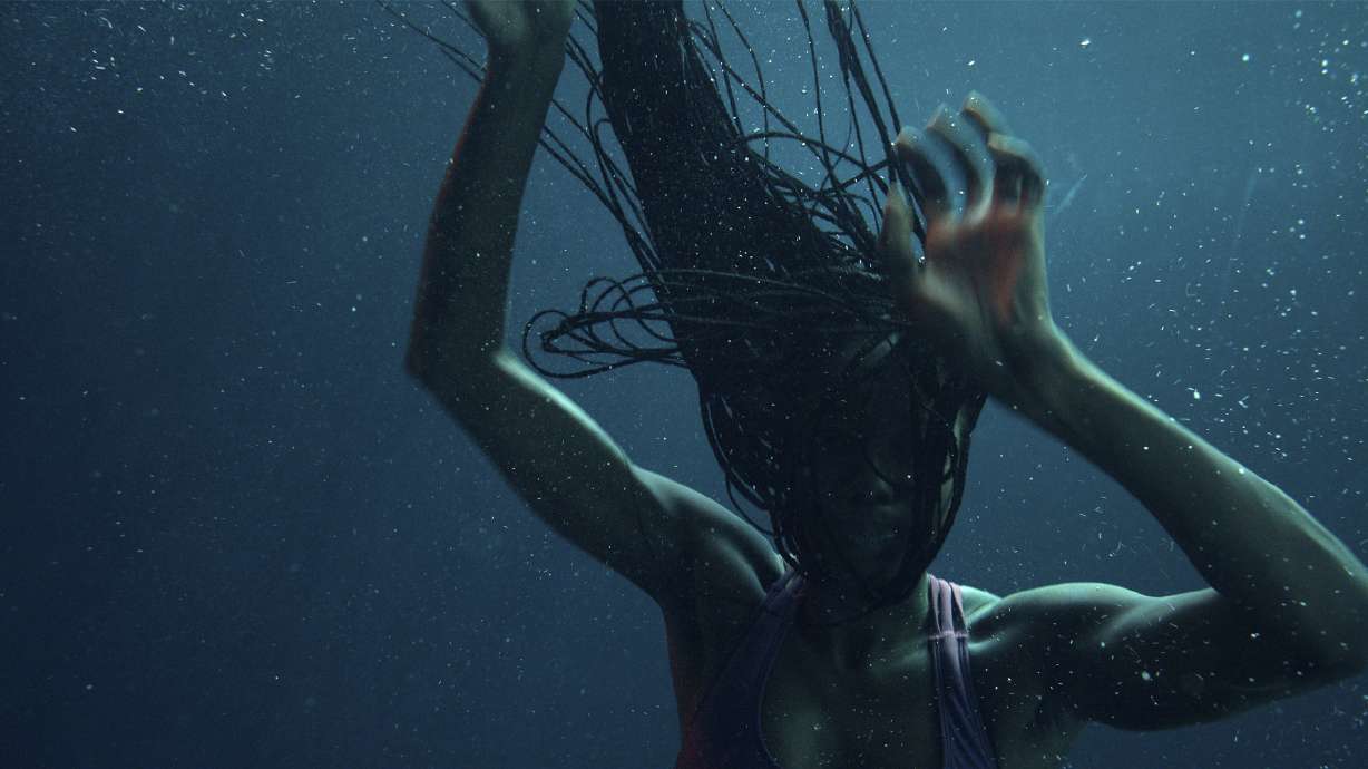 This image shows a scene from "Nanny" by Nikyatu Jusu, an official selection of the U.S. Dramatic Competition at the 2022 Sundance Film Festival.