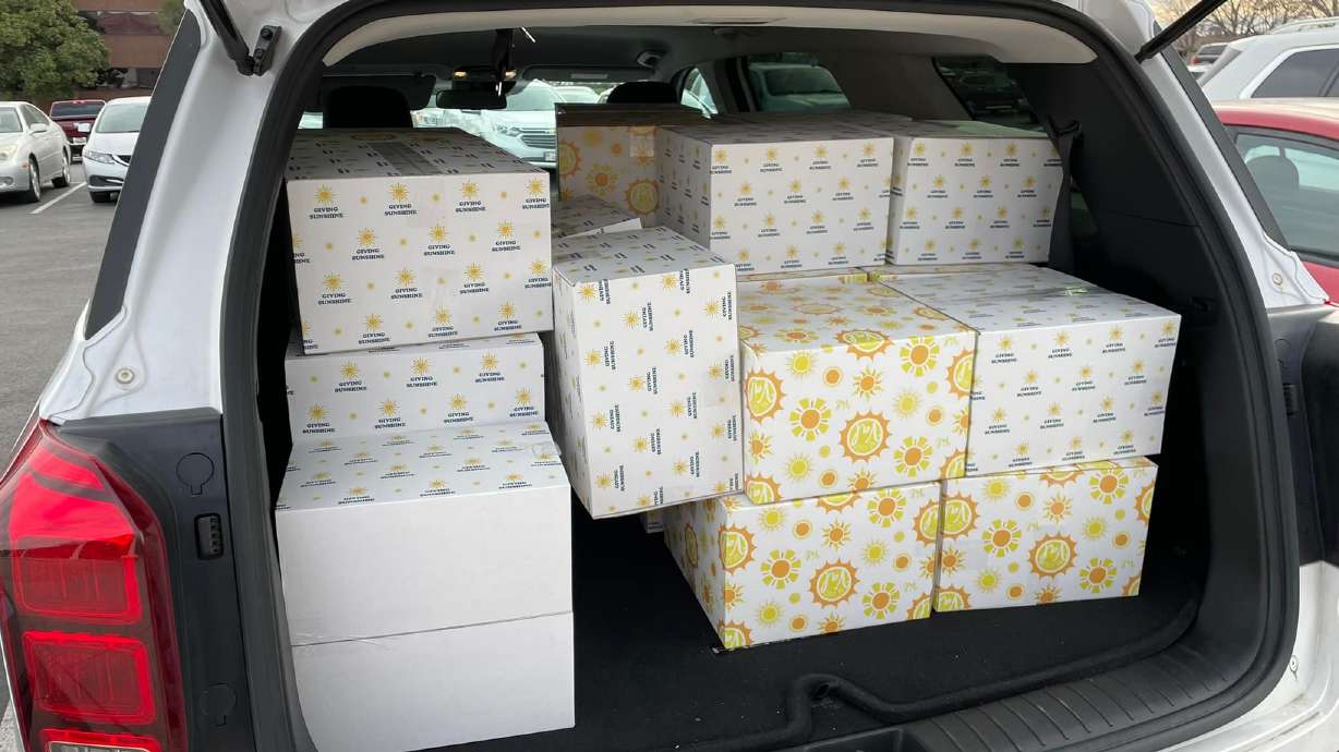 These sunshine boxes loaded into the back of a car were pulled together as part of a project at a conference for widows and widowers in St. George. The project was organized by Jason Clawson and his company, Giving Sunshine, to help people who are grieving.