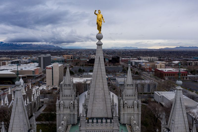 The Angel Moroni statue atop the Salt Lake Temple of
The Church of Jesus Christ of Latter-day Saints stands with its
trumpet missing after a 5.7 magnitude earthquake centered in Magna
hit on Wednesday, March 18, 2020.