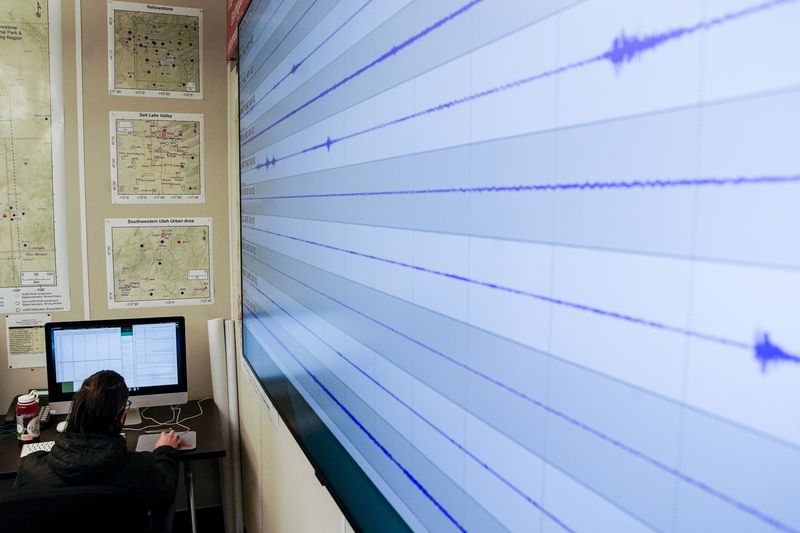 University of Utah senior Andreas Groth Cordova works
on collecting data at the school’s seismic center in Salt Lake City
on Friday.