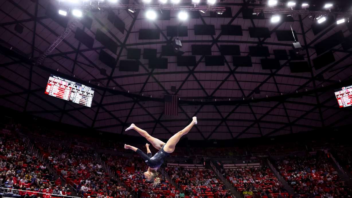 Utah’s Abby Paulson competes on beam during a meet against Stanford at the Huntsman Center in Salt Lake City on Saturday, Jan. 29, 2022.