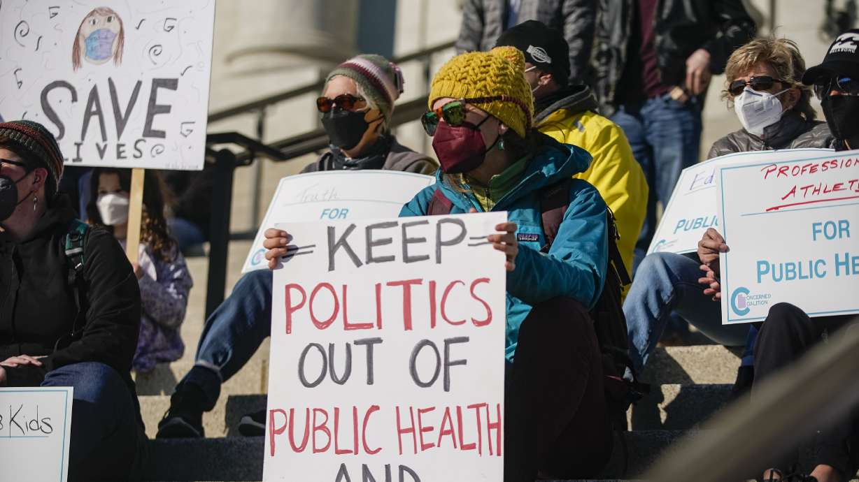 Dozens people join the Concerned Coalition Public Health Rally in demand to remove partisan politics from Utah’s public health policies at Utah State Capitol in Salt Lake City on Saturday.
