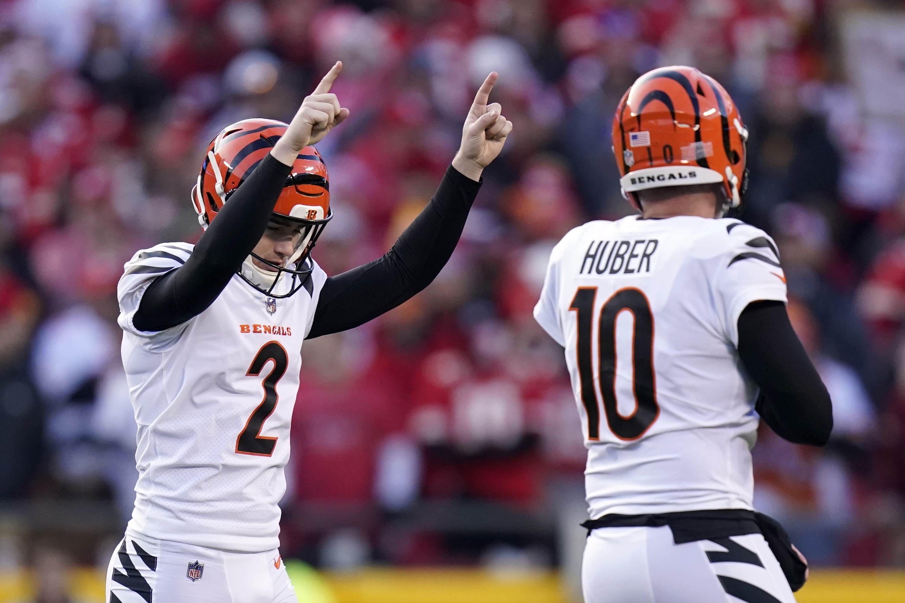 Cincinnati Bengals kicker Evan McPherson (2) celebrates with Kevin Huber (10) after kicking a 52-yard field goal during the second half of the AFC championship NFL football game against the Kansas City Chiefs, Sunday, Jan. 30, 2022, in Kansas City, Mo. 
