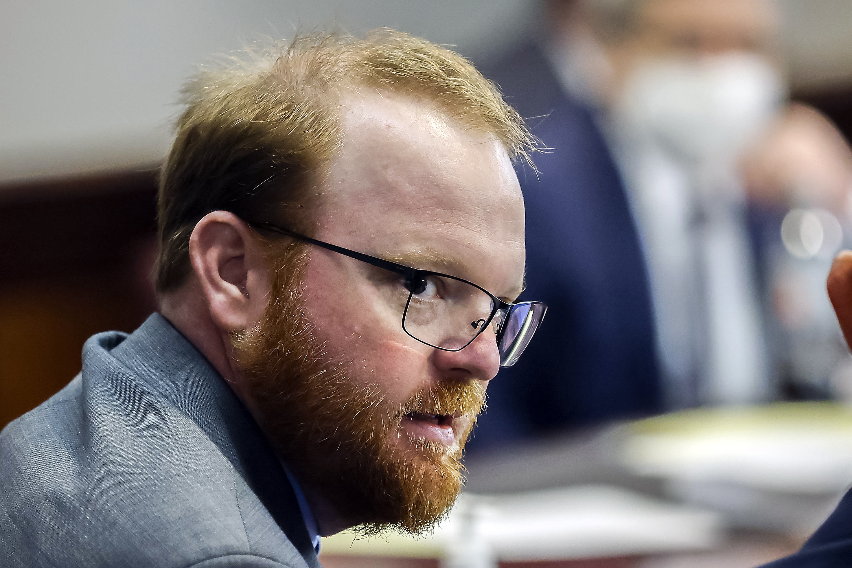 Travis McMichael is shown during the sentencing of he and his father Greg McMichael and neighbor, William "Roddie" Bryan in the Glynn County Courthouse, Jan. 7, in Brunswick, Ga.
