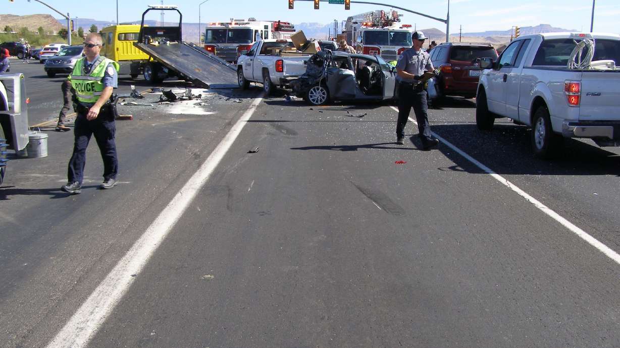 Crews clean up from a fatal crash on state Route 9 and 6300 West in St. George that killed a college student in 2019.