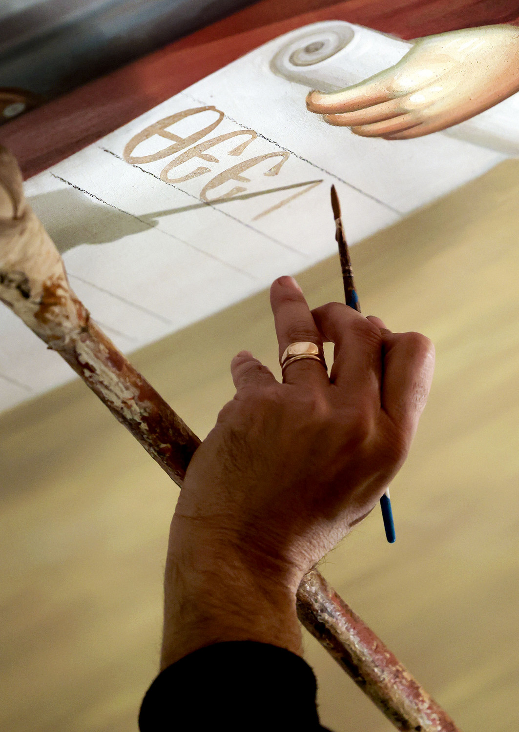 Iconographer Dionysios Bouloubassis paints the dome of the Prophet Elias Greek Orthodox Church in Holladay on Thursday, Jan. 27. The interior of the church's nave is being renovated.