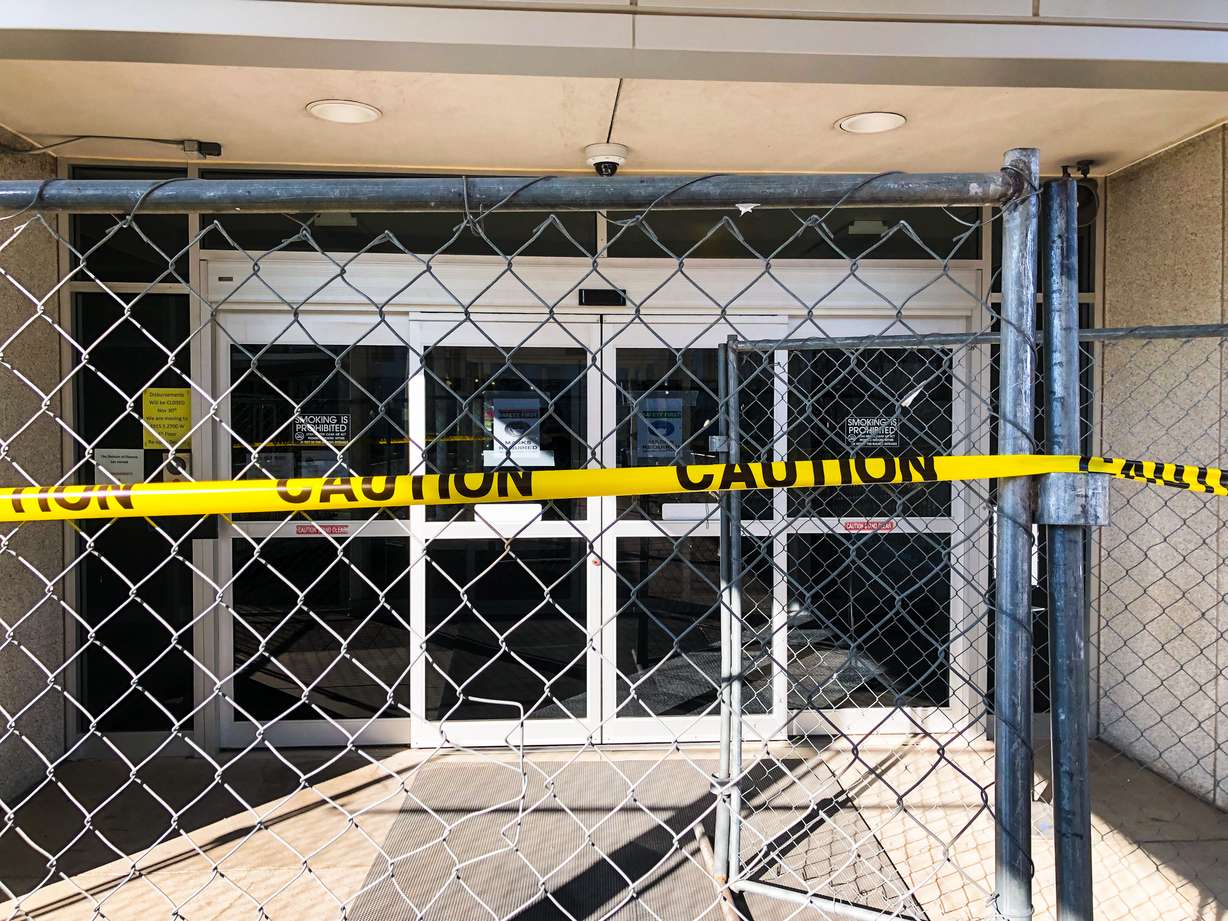 Fencing placed outside the exterior of the old State Office Building in the Utah Capitol complex. The building is slated to be demolished later this year.