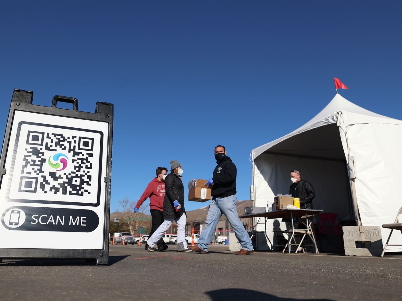 People receive COVID-19 tests at the University of Utah
in Salt Lake City on Monday. The Utah
Department of Health has opened two additional community testing
sites, one at the U. and another at Utah Valley University in Orem.
