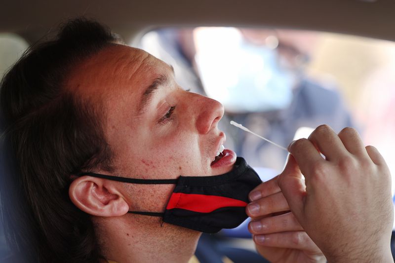 Von Satter swabs his nose for a COVID-19 test at the
University of Utah in Salt Lake City on Monday, Jan. 31, 2022. The
Utah Department of Health has opened two additional community
testing sites, one at the U. and another at Utah Valley University
in Orem.