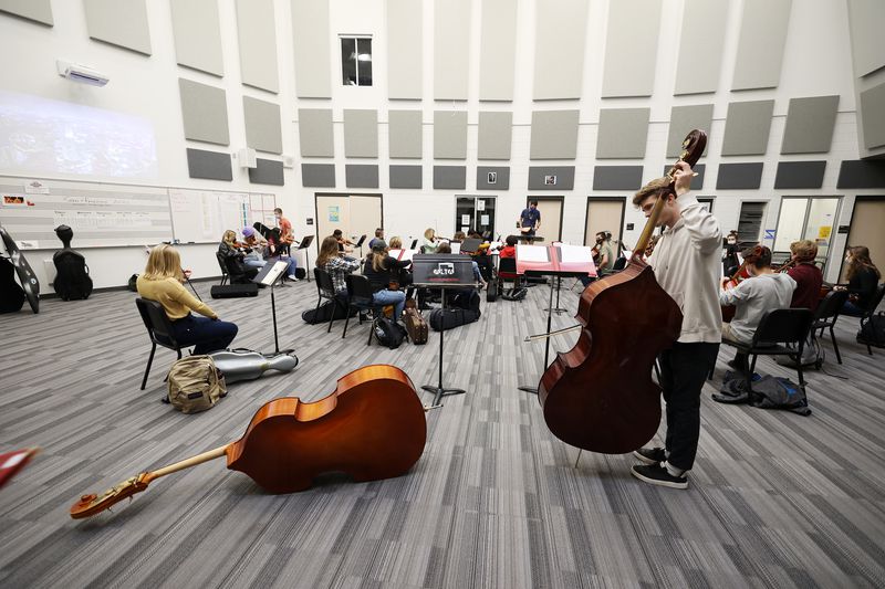 Students prepare for orchestra class at Alta High
School in Sandy on Jan. 21.