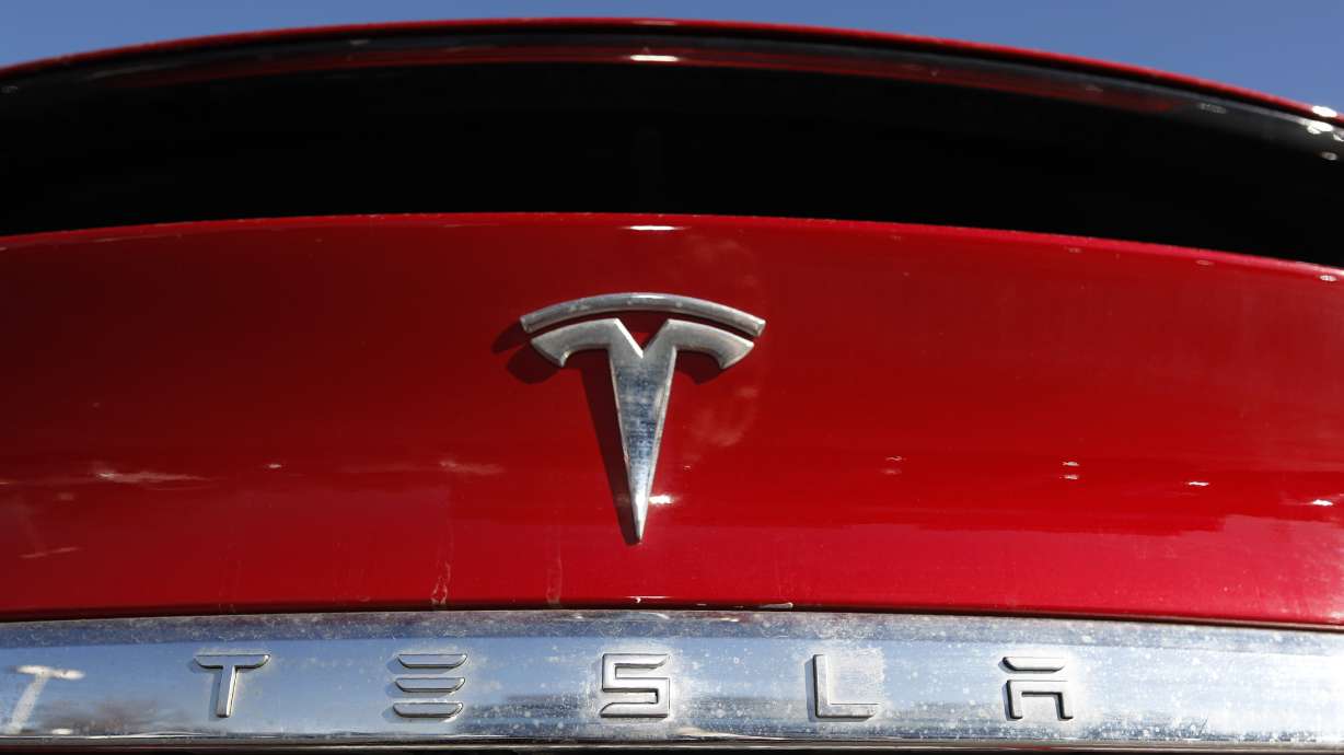 The company logo sits on an unsold 2020 Model X at a Tesla dealership in Littleton, Colo. Tesla Inc. on Wednesday.