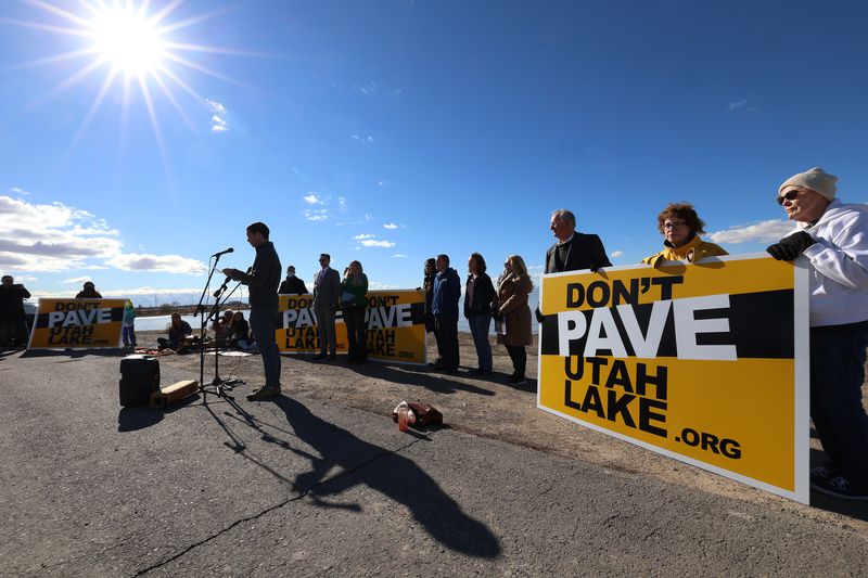 Ben Abbott, an assistant professor of ecosystem ecology at Brigham Young University, speaks at a press conference on the shores of Utah Lake in Lindon on Tuesday. The press conference was held in response to a $3 million lawsuit filed by
Lake Restorations Solutions, a company proposing to build islands on Utah Lake, against Abbott for his comments about the project.
